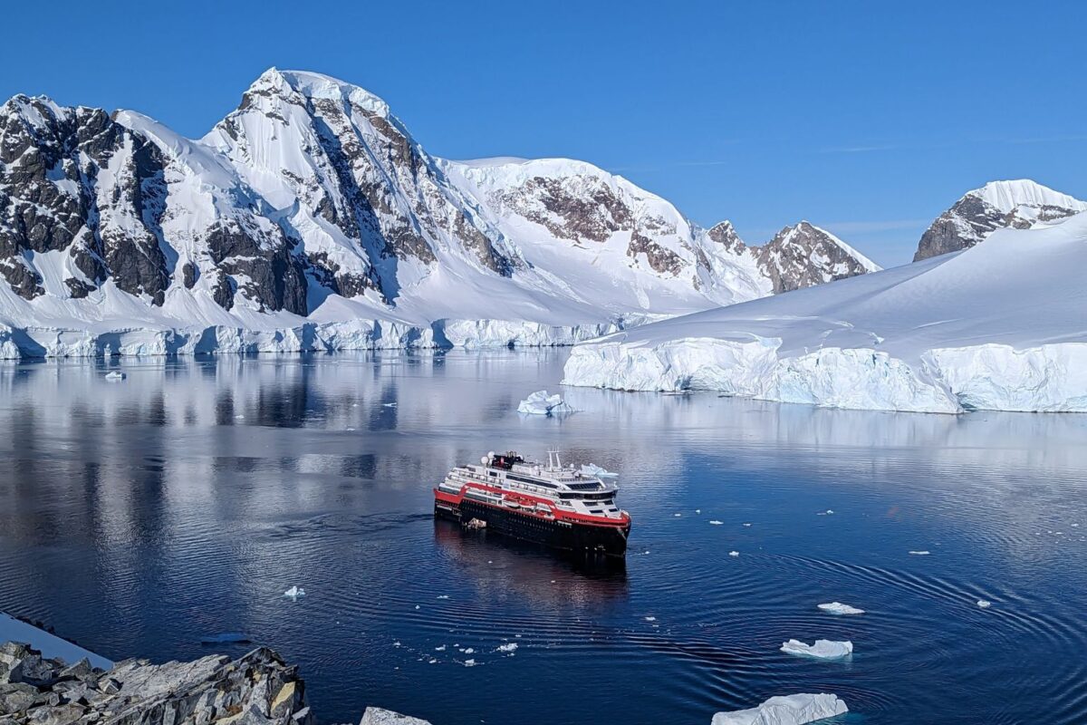 The MS Fridtjof Nansen near González Videla Antarctic Base in Antarctica. Photo by Christopher Elliott - Must Travel Destination 