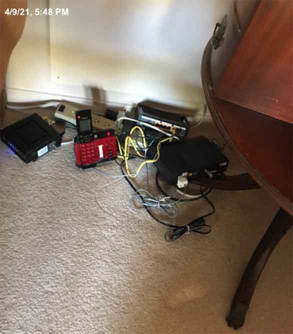 Is this pile of tangled wires a justification for extra cleaning charges at this vacation rental?