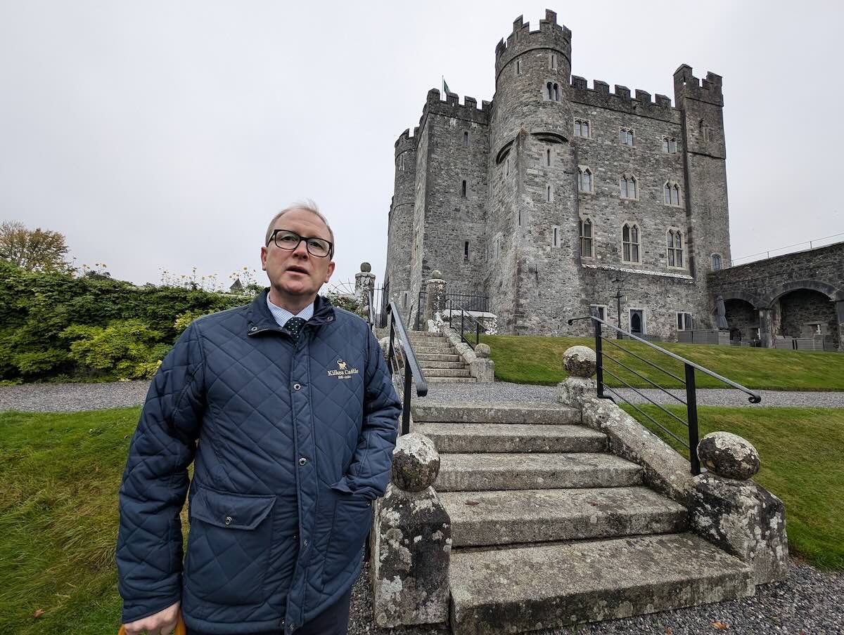 Adrian Mooney, sales director of Kilkea Castle Estate & Golf Club, in front of Kilkea Castle.